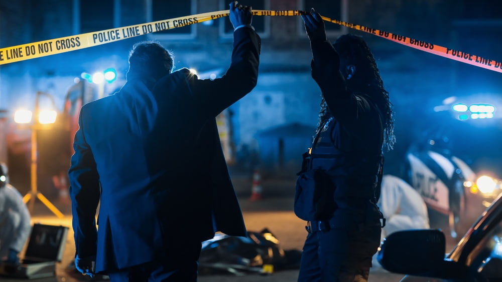 Two agents arriving at the crime scene