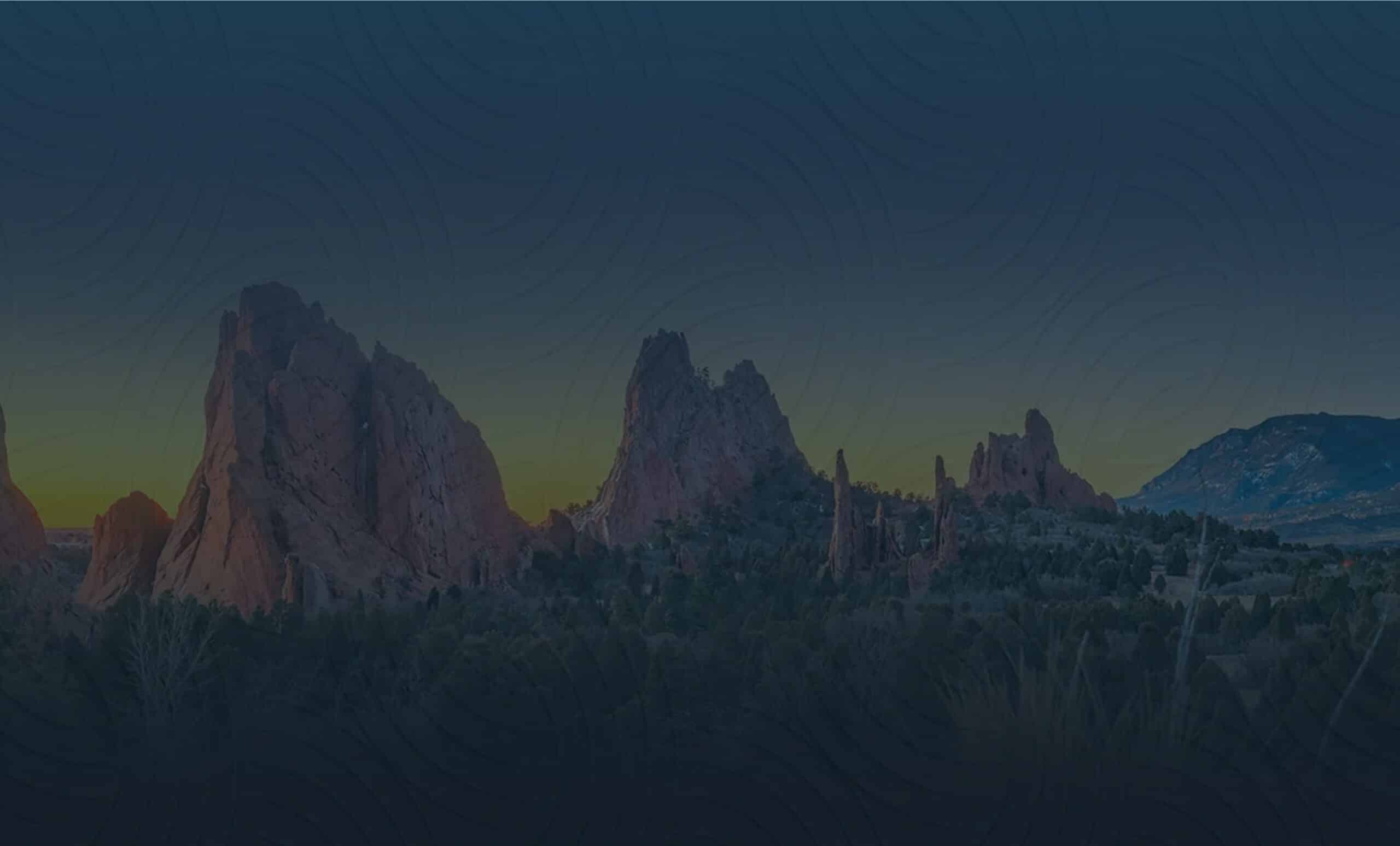 Stunning sunset over rocky mountain formations